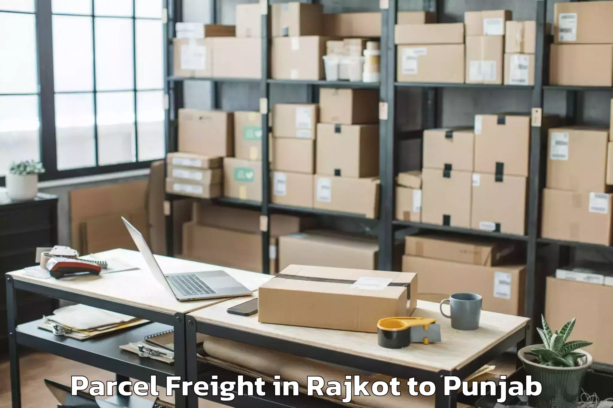 Book Rajkot to Gna University Phagwara Parcel Freight